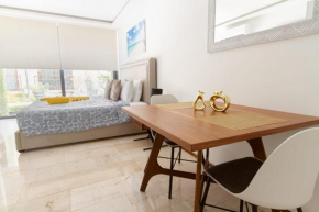 Studio in top location with AC Kitchen Pool Gym and Rooftop view of the Caribbean